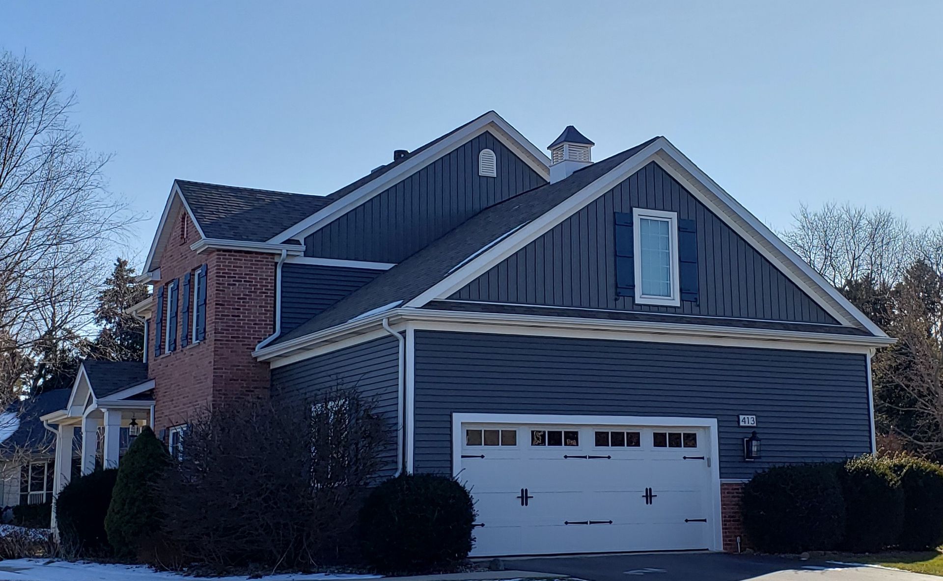 New siding on a house in the snow